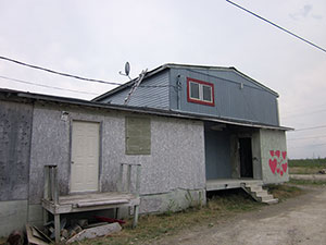 Photo of police officer housing in a state of disrepair