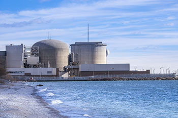 This photograph shows the Pickering Nuclear Generating Station in Pickering, Ontario